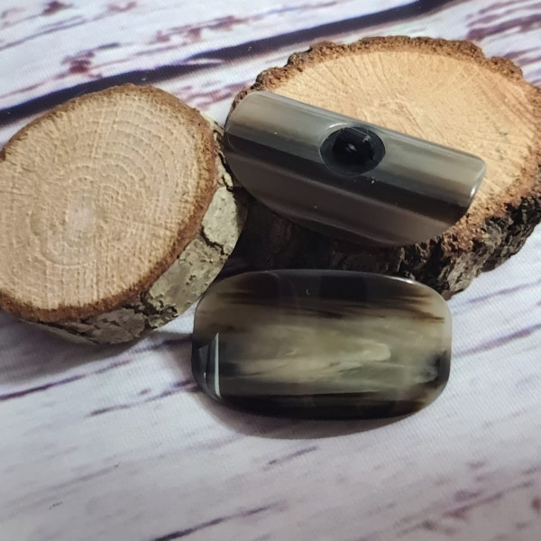 1 Knopf | Kunststoff | Öse | ca.40mm x 23mm | geschwungen