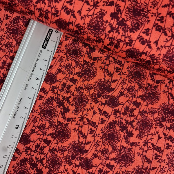 Baumwolle | bedruckt | fleur | blutorange/schwarz