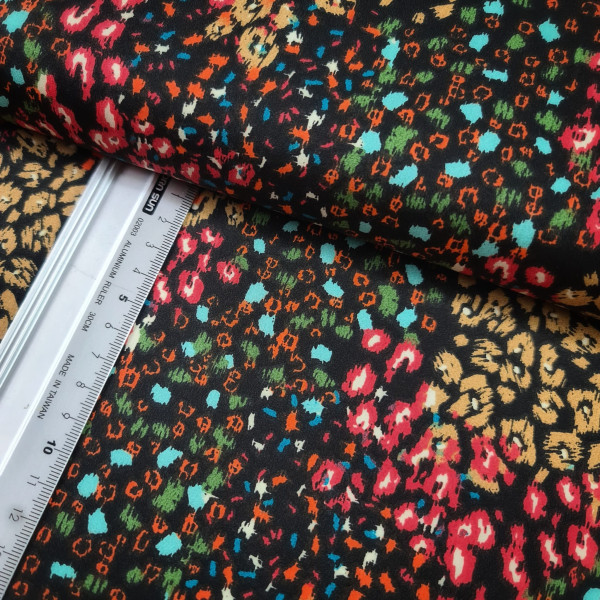 Baumwolle | bedruckt | animal skin | rot/bunt