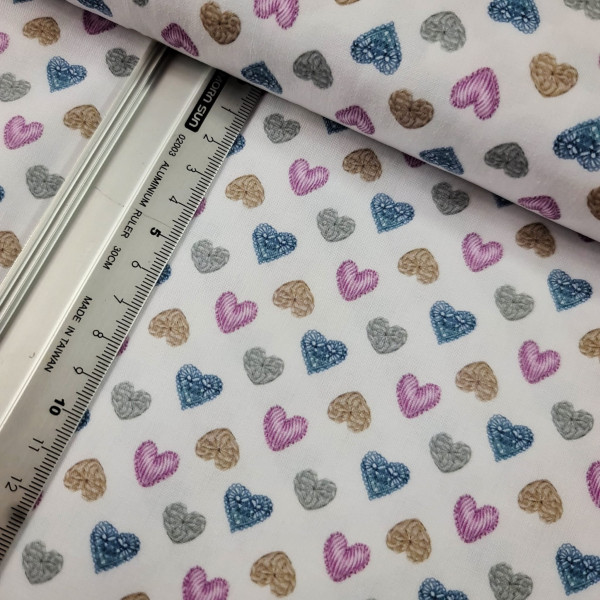 Baumwolle | bedruckt | bunte Herzen | weiß