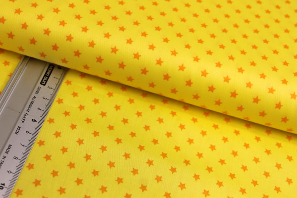 Baumwolle | bedruckt | Sterne | gelb/orange